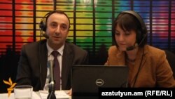 Armenia -- Minister of Justice Hrayr Tovmasian (L) and RFE/RL journalist Narine Ghalechian live on Azatutyun TV, Yerevan, 06Apr2011