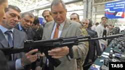Russian Deputy Prime Minister Dmitry Rogozin (center) inspecting Kalashnikov rifles earlier this year. 