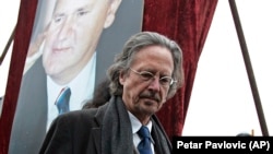 Austrian author and 2019 Nobel prizewinner Peter Handke at the funeral of late Serbian leader Slobodan Milosevic in 2006. 