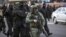 Belarus - Belarusian law enforcement officers block opposition supporters during their rally to reject the presidential election results in Minsk, 1nov2020