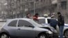 Armenia -- Traffic police investigate a car collision in Yerevan, 11Jan2010.