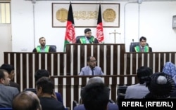 Afghan Supreme Court judge reads the decision in the case on May 26.