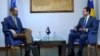Kosovo's new prime minister Albin Kurti (right) made his remarks in an interview with RFE/RL's Balkan Service on February 7.