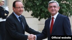 France -- French President François Hollande (L) meets his Armenian counterpart Serzh Sarkisian at the Élysée Palace, 12 Nov, 2012
