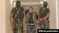 Azerbaijan - Armenian captive Karen Petrosyan is taken into Azerbaijani custody - 08Aug2014 