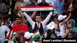 Жыхары Эрбілю, сталіцы ірацкага Курдыстану, 16 верасьня вітаюць рэфэрэндум