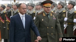 Armenia - Defense Ministers Seyran Ohanian (L) of Armenia and Sergey Shoygu of Russia inspect an Armenian honor guard before talks in Yerevan, 29Jan2013.