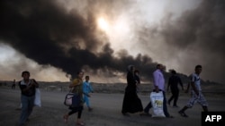 Мосулду таштап кетип бараткан качкындар