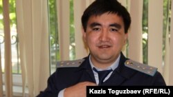 Прокурор Даурен Халыков, поддерживающий государственное обвинение по делу Гузяль Байдалиновой. Алматы, 13 мая 2016 года.