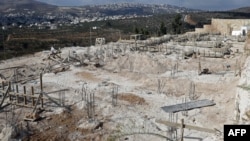 عکس‌ها مربوط به خانه‌های در حال ساخت‌و‌ساز در کرانه باختری در سپتامبر سال ۲۰۱۸ است