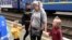 Kateryna and her children arrive in Mukachevo, western Ukraine, with the help of the Proliska humanitarian group.