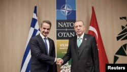 Կիրիակոս Միցոտակիսը և Ռեջեփ Թայիփ Էրդողանը ՆԱՏՕ-ի գագաթնաժողովում, Վիլնյուս, 12 հուլիսի, 2023թ.