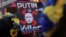 Під час акції «Стоп геноциду народу України» проти вторгнення Росії в Україну. На плакаті напис англійською: «Путін – вбивця». Нью-Йорк, США, 9 квітня 2022 року