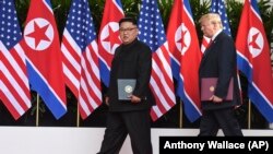 دونالد ترامپ، رئیس جمهوری آمریکا، و کیم جونگ اون، رهبر کره شمالی، در سنگاپور
