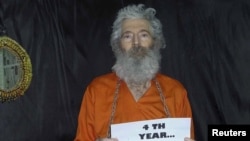 رابرت (باب) لوینسون، مأمور پیشین پلیس فدرال آمریکا