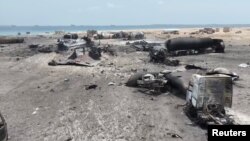 Йемендеги Рас-Иса порту 18-апрелдеги соккудан кийин.