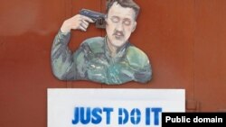 Карикатура художника Сергія Захарова на російського полковника Ігоря Гіркіна (Стрєлкова), який на той час був так званим «міністром оборони» угруповання «ДНР». Донецьк, серпень 2014 року