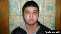 Россия суди томонидан қотилликда айбланган Бобур Солиев.