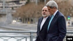 جان کری و محمد جواد ظریف در جریان گفت‌وگوهای اتمی در ژنو