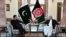 Afghan President Ashraf Ghani (right) and Pakistani Prime Minister Imran Khan discussed bilateral relations during a meeting at the presidential palace in Kabul on November 19.