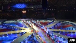 Британи -- 2012-чу шеран Олимпин ловзарш дIадерзоран церемони хилира Лондонерчу Олимпин стадионехь,12Марс2012