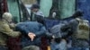 Law enforcement officers detain opposition supporters in Minsk, on November 29, 2020.