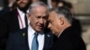 Israeli Prime Minister Benjamin Netanyahu (left) and Hungarian Prime Minister Viktor Orban talk at Buda Castle in Budapest on April 3.
