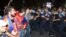 Полиция разгоняет собравшихся на проспекте Баграмяна демонстрантов, Ереван, 12 сентября 2015 г. 