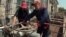 Armenia -- Workers at a natural gas distribution facility.