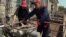 Armenia -- Workers at a natural gas distribution facility.