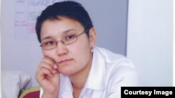 Рита Карасартова.