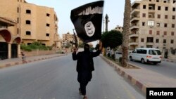 "Yslam döwleti" atly toparyň agzasy.