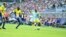 Ghanaian Patrick Twumasi (right) of FC Astana crosses the ball during a game against HJK Helsinki in Astana on August 5.