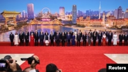 China - Leaders and officials, including Chinese President Xi Jinping and Russian President Vladimir Putin, attend a photo ceremony at the Shanghai Cooperation Organisation (SCO) summit in Tianjin, August 31, 2025.