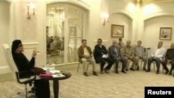 تصویری که تلویزیون لیبی از معمر قذافی در روز چهارشنبه نشان داده است 