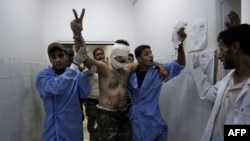 Поранений лівійський повстанець