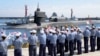 Американската подводница USS Michigan, клас "Охайо", акостира във военноморската база Пусан в Южна Корея за рутинно посещение, 13 октомври 2017 г. 