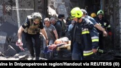 Дніпро у жалобі: через атаку РФ загинули 18 людей (фотосвідчення)