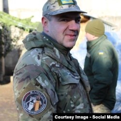 Роман Донік