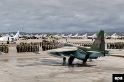 Торжественная церемония начала вывода российской авиационной группы из Сирии. 15 марта 2016 года