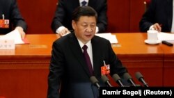 Си Цзиньпин выступает на заключительном заседании 1-й сессии Всекитайского собрания народных представителей (ВСНП) 13-го созыва. 20 марта 2017 года