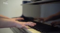 Оркестр, що чує артилерію: як музиканти і співаки вчаться в місті на лінії фронту