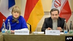 عباس عراقچی و هلگا اشمید در مذاکرات اتمی در سال ۱۳۹۳