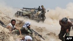 Ирактын  өкмөтчүл  күчтөр Фаллужанын жанындагы ал-Сижар кыштагында. 24-май, 2016-жыл. 