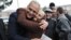 Armenia - Opposition presidential candidate Raffi Hovannisian is hugged by a supporter during a campaign trip to Ararat region, 29Jan2013.