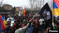 Armenia -- Anti-LGBT activists demonstrate outside the parliament building in Yerevan, April 8, 2019.