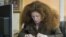 Russia -- Radio host and journalist Yulia Latynina works in the Ekho Moskvy office, Moscow, February 19, 2014