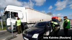 Яке аз гузаргоҳҳои марзии Литва. Акс аз бойгонӣ.