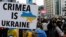 Канада. Під час акції з вимогою до Росії припини війну проти України. Торонто, 27 лютого 2022 року 