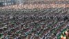 IRGC troops march during a military parade commemorating the anniversary of start of the 1980-88 Iraq-Iran War in front of the shrine of the late revolutionary founder, Ayatollah Khomeini, just outside Tehran.